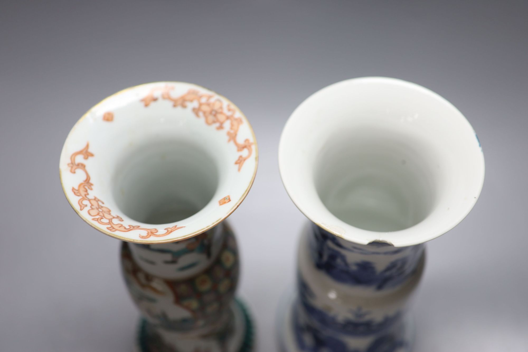 A Chinese blue and white beaker vase, together with a similar famille verte beaker vase, both c.1900, tallest 25.5cm